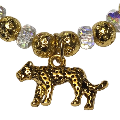 Charmed Cheetah gemstone bracelet with gold-dipped lava stones, aurora borealis faceted crystal rondelles, and an antique gold cheetah charm by Fancyness Revival.