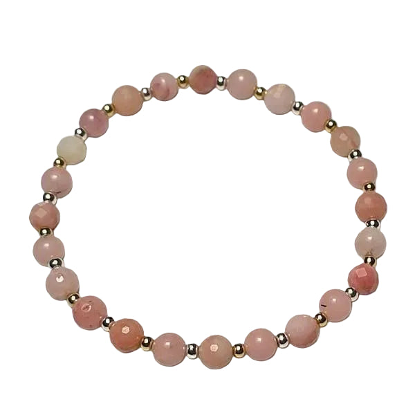 pink beaded bracelt with gold and silver small bead accents