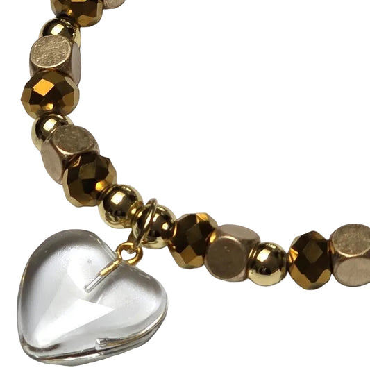 gold and copper beads with a clear glass heart charm