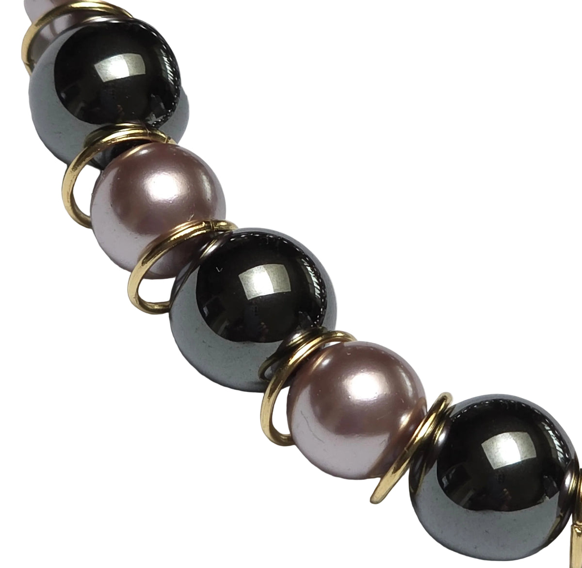 grey metallic beads and lavender beads withe gold rings