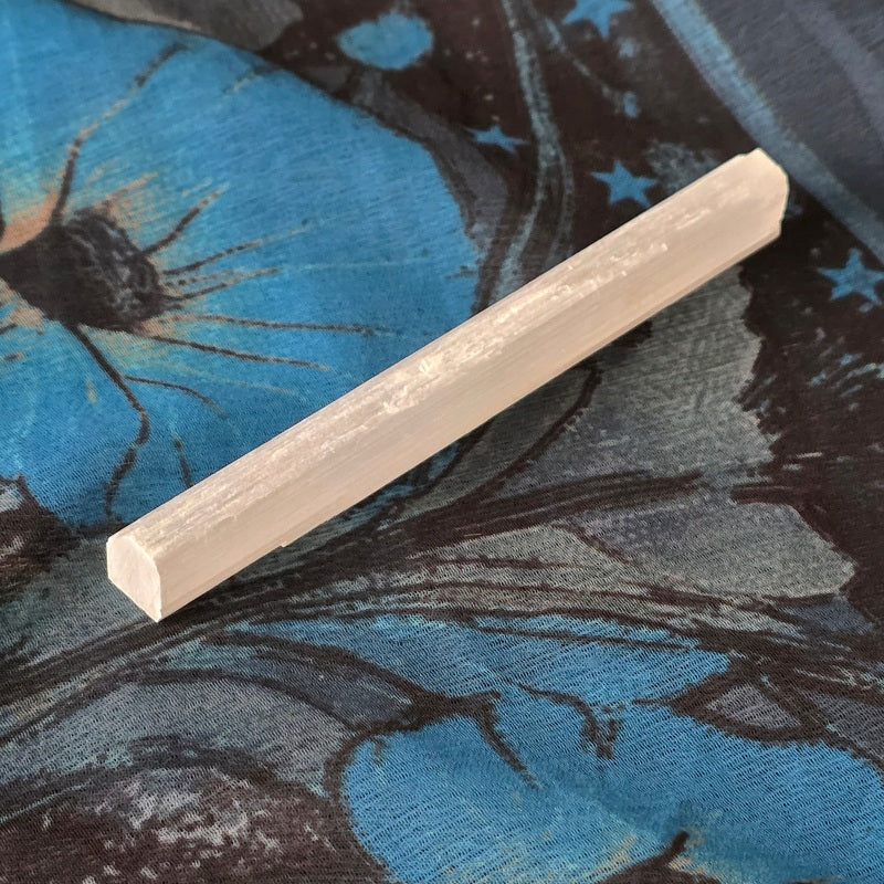 white gemstone wand shaped